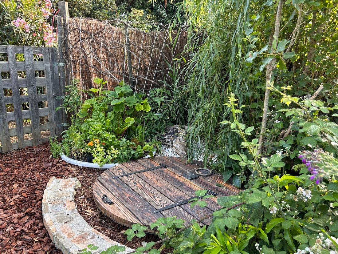 Dans un coin de jardin se trouve deux cuves enterré dont on ne voit que deux ronds à la surface de 1m2 chacun. L&